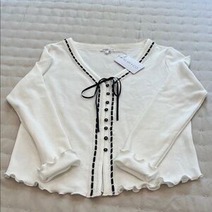 Elegant White Button-Up Blouse with Black Trim